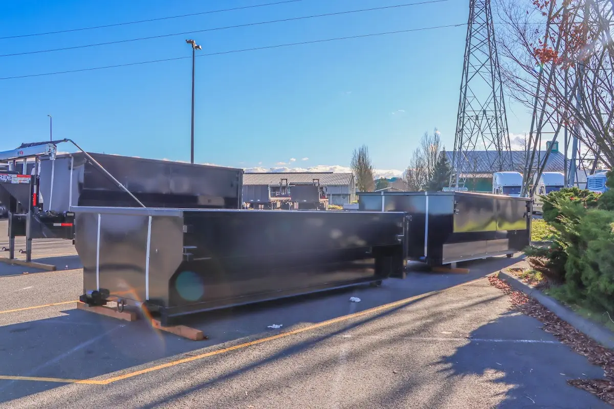 Roll-off dumpster ready for waste disposal at job site for 3 Yard Dumpster Rental in Newport
